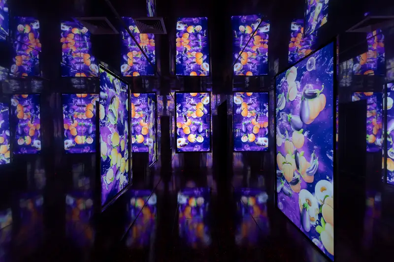 The Hall of Mirrors at Wellmax — projected digital art repeating infinitely in mirrored walls, Bangkok