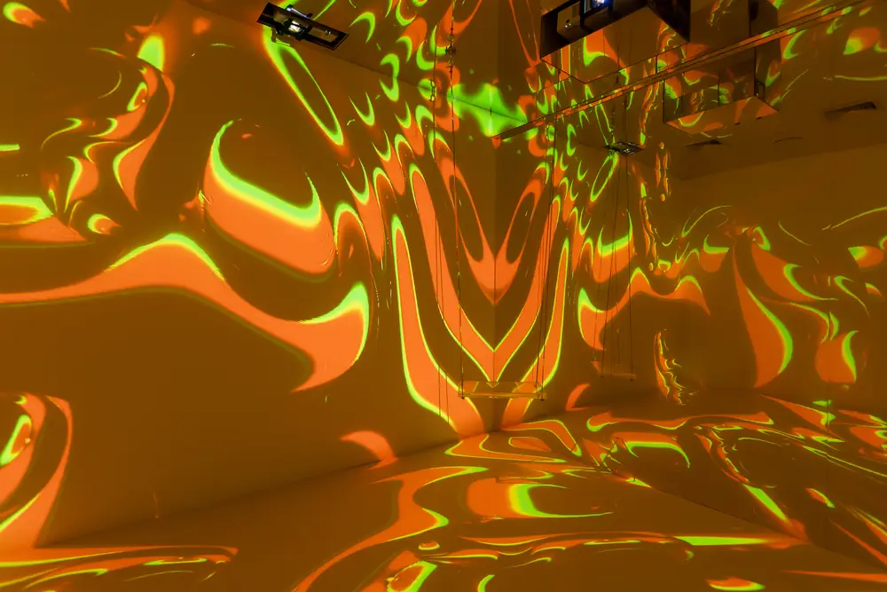 Projected light and colour filling the Immersive Room at Wellmax saunatainment, Bangkok