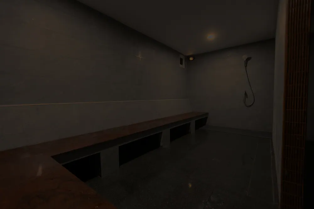 The dark herbal steam room at Wellmax gay sauna, Bangkok